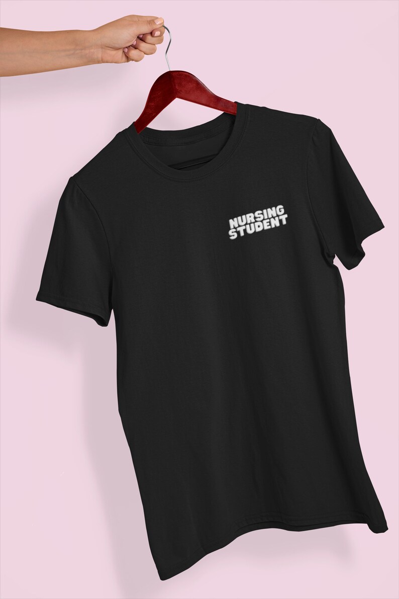 May include: Black t-shirt with the text "Nursing Student" in white lettering.