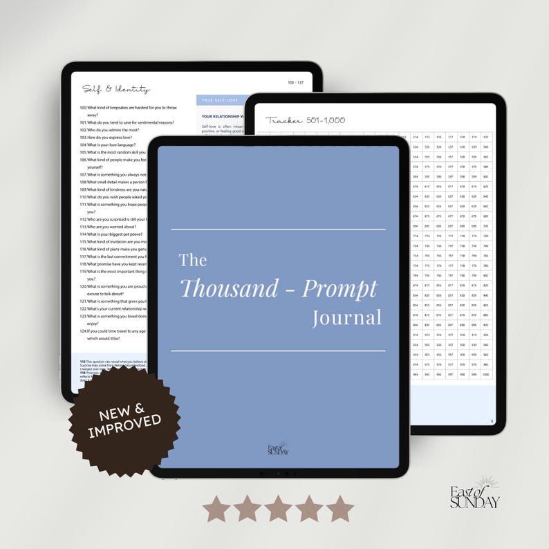 May include: A digital journal titled "The Thousand - Prompt Journal" on a tablet, with a light blue cover. The image also shows two other tablets with journal prompts and a tracker. A brown "NEW & IMPROVED" sticker is visible.