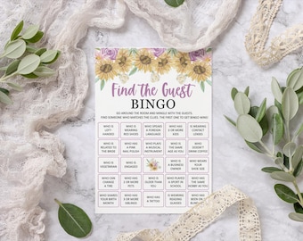 May include: A white bingo card with the text "Find the Guest BINGO" is decorated with watercolor sunflowers and lavender flowers. The card has a grid of prompts for guests to mingle and find matches.