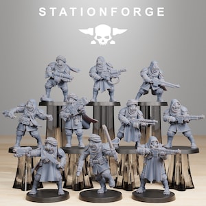 May include: A set of nine gray plastic miniature figures wearing gas masks and holding weapons. The figures are posed in various action stances and are standing on circular bases. The figures are part of a tabletop wargame.