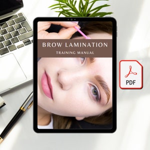 May include: A digital tablet displaying a training manual for brow lamination. The cover features a close-up of a woman's face with her eyebrows being treated. The title of the manual is "Brow Lamination Training Manual".