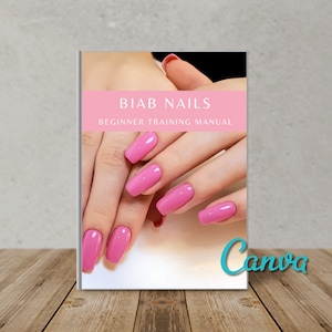 May include: A pink book with the title "BIAB NAILS BEGINNER TRAINING MANUAL" and a photo of hands with pink nail polish on a white background.