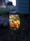 Mini lanterns. Hanging mason jar, with solar powered fairy lights.