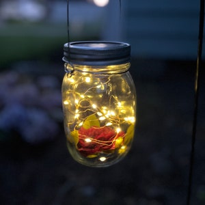 Mini lanterns. Hanging mason jar, with solar powered fairy lights.