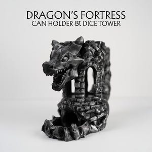 May include: A black and grey dragon-themed can holder and dice tower. The tower is designed to resemble a fortress, with a dragon's head at the top. The text "DRAGON'S FORTRESS CAN HOLDER & DICE TOWER" is above the product.