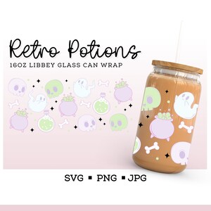 May include: A 16oz glass can wrap with a retro potion theme. The design features a repeating pattern of skulls, ghosts, cauldrons, potion bottles, and bones in pastel green, purple, and white on a pink background.