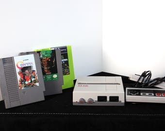 Nintendo Bundle: Contra, Tecmo Bowl, 150 games in 1, NES Emulator + 2 controller