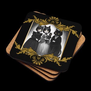 May include: A set of square coasters featuring a gothic illustration of three cat-like figures in Victorian attire, framed by ornate gold filigree on a black background. The coasters are stacked on a cork base, creating a unique and artistic home decor item.