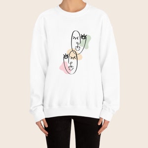 Intertwined Faces Line Drawing Unisex Heavy Blend Crewneck Sweatshirt