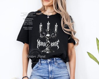 キャンデラブラ スカル グラフィック Tシャツ、ドラミオン ファンダム コンフォートカラー