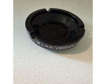 Vintage Las Vegas Hilton Hotel 3 Slot Round Black Glass Ashtray Advertising