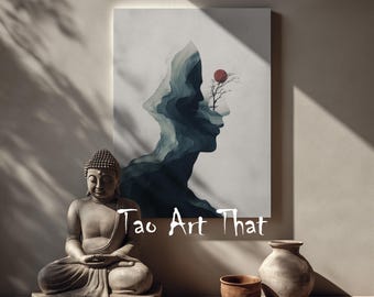 May include: A serene composition featuring a seated Buddha statue, a canvas print with a face-like mountain silhouette, and minimalist pottery. The canvas art has a red sun and a tree. The text "Tao Art That" is visible.