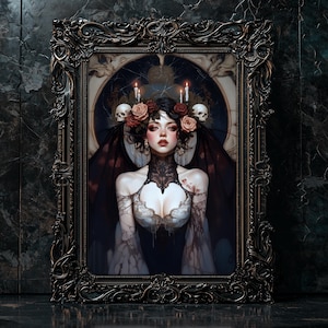 May include: A framed gothic portrait features a woman with a floral and skull headdress, candles, and dark wings. The ornate black frame surrounds the artwork, set against a dark, textured background. The woman's attire includes a lace collar and a low-cut bodice.