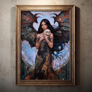 May include: A framed artwork featuring a woman with long black hair, holding a skull. She wears a dark, patterned dress and has tattoos on her arms. The background includes stylized wings and a stained-glass effect, all within a gold frame.