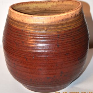 Vintage natural looking vase signed