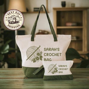 A large white tote bag with a green handle and a smaller bag with a similar design, both featuring the text "SARAH'S CROCHET BAG" and a crochet ball graphic.