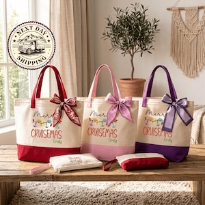 three tote bags with Christmas-themed designs, each with a bow and the text "Merry Cruisemas Emily" printed on them. The bags are placed on a wooden surface, and there is a potted plant in the background.