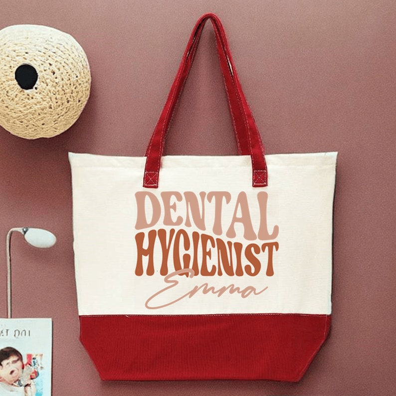 a red and white tote bag sitting on top of a table