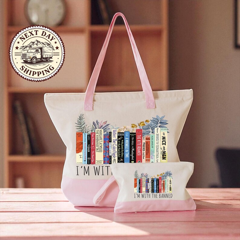 A pink tote bag with a printed design of colorful books and the text "I'm wit" printed on it, along with a smaller white bag with the same design and text.