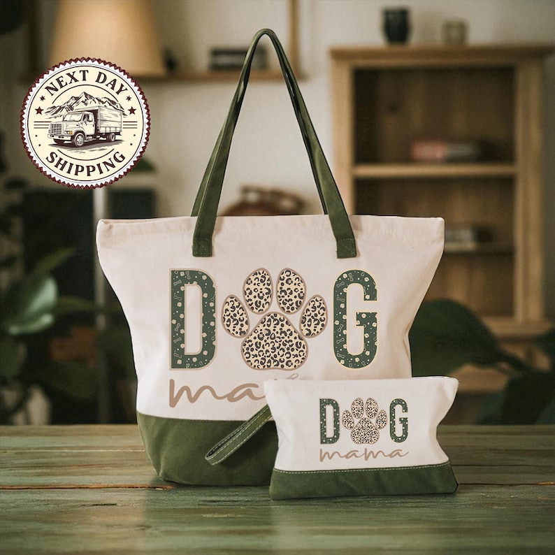 A large tote bag with a leopard print paw print design and the word "DOG" printed on it, along with a smaller bag that also has a leopard print paw print design and the word "DOG" printed on it. The bags are placed on a wooden surface, and there is a sign in the background that says "NEXT DAY SHIPPING".