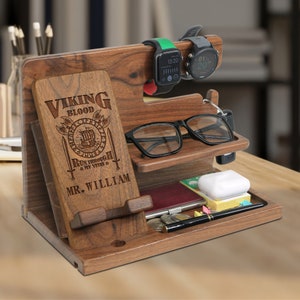 May include: A wooden organizer with a phone stand, watch holders, a glasses shelf, and a small tray. The organizer is engraved with the text "Viking Blood Run Through My Veins" and "Mr. William".