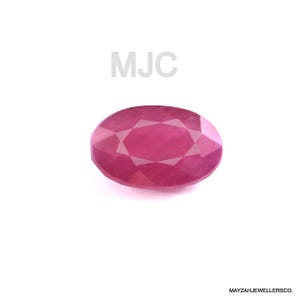 May include: A faceted, oval ruby gemstone in a deep red hue. The gem is displayed against a white backdrop. The text "MJC" is above the ruby, and "MAYZAHJEWELLERSCO." is below. A classic gemstone for jewellery.