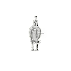 May include: Silver pendant in the shape of a horse's rear end. The pendant is detailed with a textured surface and a flowing tail.