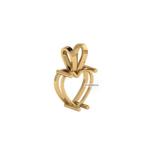 Può includere: Un ciondolo dorato a forma di cuore. Il ciondolo ha un anello nella parte superiore per una catena e un design a cuore a doppio strato. Il testo "A1SILVERHUB" è visibile sul lato destro del cuore.