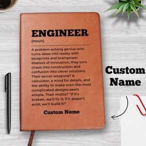 May include: A brown leather journal with the word "Engineer" defined as a problem-solving genius. The journal has a space for a custom name.