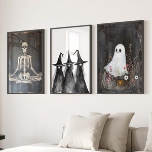 May include: Three black and white witch illustrations with pointed hats and flowing robes, a white ghost illustration with a black background, and a skeleton illustration in a yoga pose.