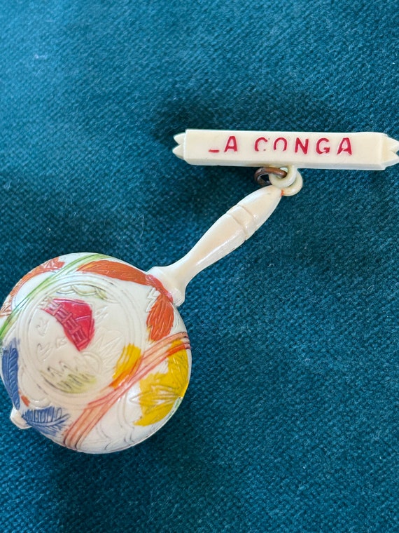 Vintage La Conga Maraca Celluloid Pin - image 2