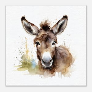 May include: A watercolour illustration of a brown donkey head with large ears and a tuft of hair on its forehead. The artwork features soft brushstrokes and paint splatters in shades of brown, tan, and muted green against a white background.