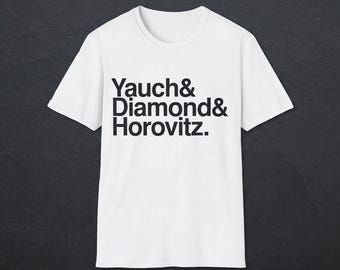 May include: A white short-sleeved t-shirt featuring black text printed on the chest. The text reads Yauch& Diamond& Horovitz. in a bold, sans-serif font. The garment has a standard crew neckline and a straight hemline, presented in a clean design.