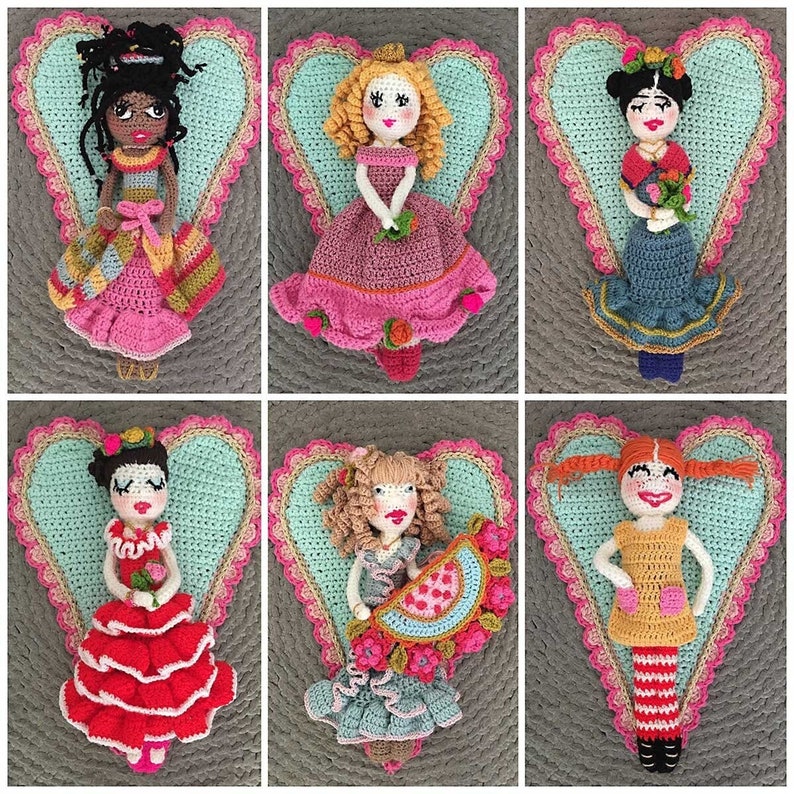 May include: Six crocheted dolls in different outfits and poses, each placed in a heart-shaped crocheted frame with a light blue center and pink border.