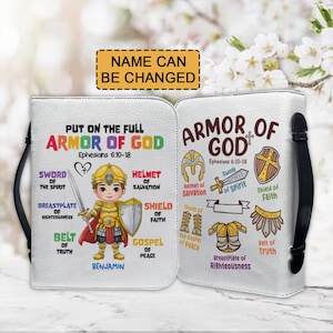 May include: A white and black Bible cover with a colorful illustration of a knight wearing armor. The text "Put on the full Armor of God" and "Ephesians 6:10-18" is printed on the cover. The knight is holding a sword and shield. The armor is labeled with different parts of the armor of God, such as "Sword of the Spirit", "Breastplate of Righteousness", "Belt of Truth", "Helmet of Salvation", "Shield of Faith", and "Gospel of Peace".