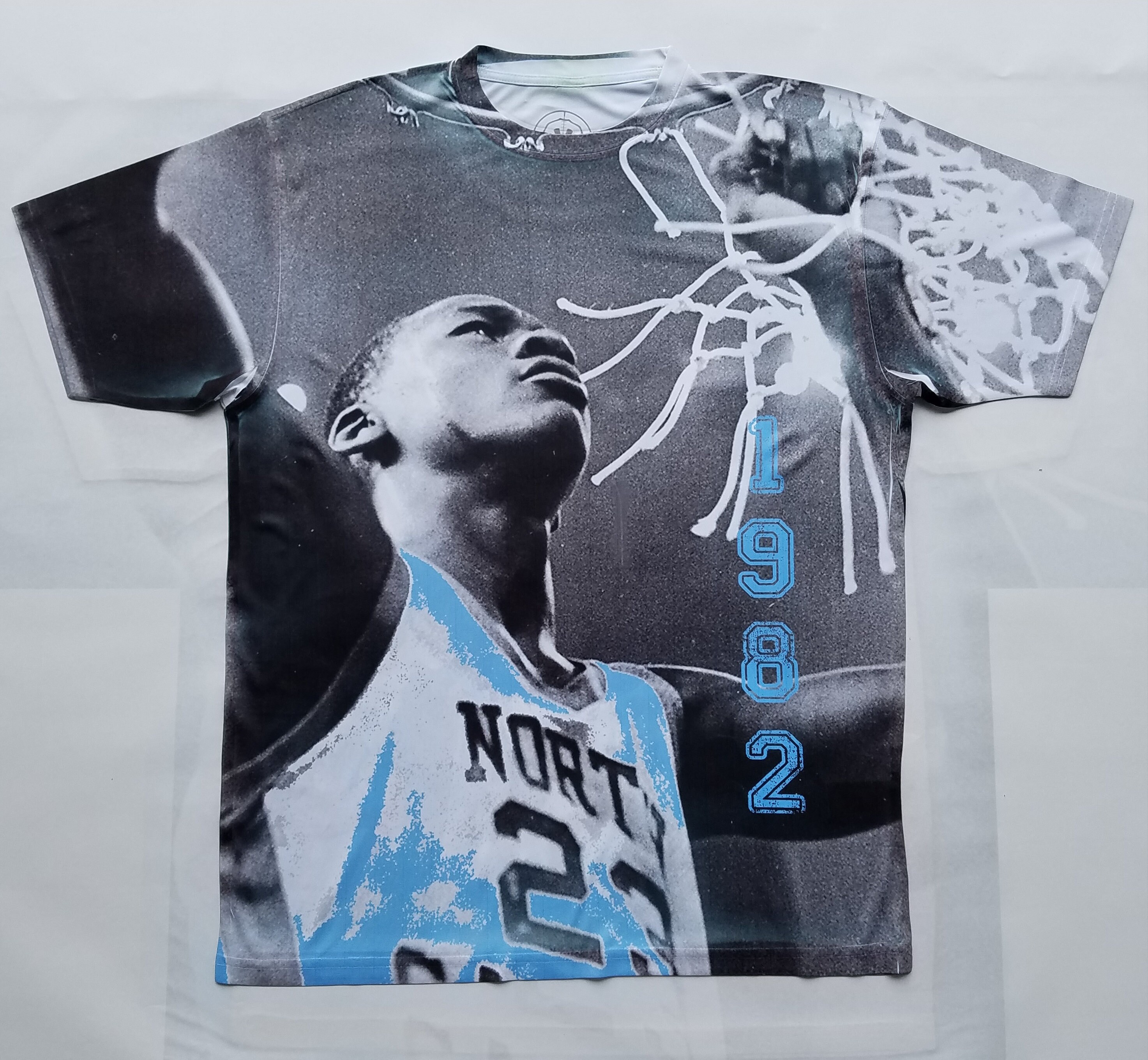 Carolina blue jordan shirt deals