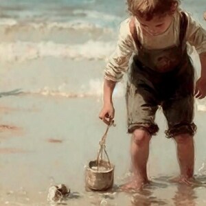 May include: A young child in overalls and a white shirt stands on a sandy beach, holding a small bucket and a stick. The child is looking down at the bucket, which is filled with sand.