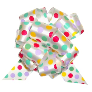 May include: A white satin ribbon with colourful polka dots in red, yellow, green, and purple. The ribbon is tied into a bow.