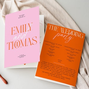 May include: A pink and orange wedding invitation suite with the names Emily and Thomas printed in a modern font. The orange card lists the wedding party with the title "The Wedding Party".