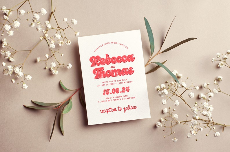 May include: A white wedding invitation with red text. The invitation reads "Together with their families, Rebecca and Thomas invite you to join them as they celebrate their wedding 15.06.24 3pm at Harelaw Farm, Glasgow Rd | Fenwick | Kilmarnock, reception to follow."