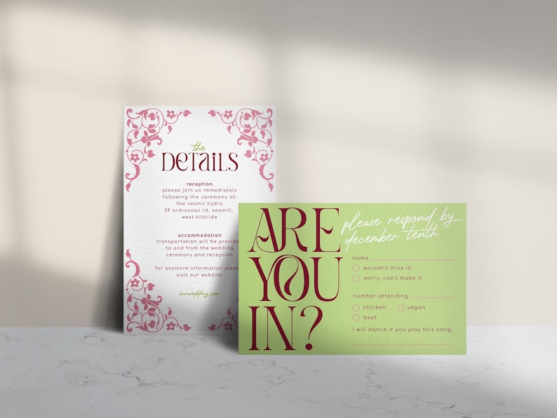 May include: Two wedding stationery cards. One white card with pink floral accents and the word "DETAILS". The other is a green card with the words "ARE YOU IN?" and "please respond by december tenth".