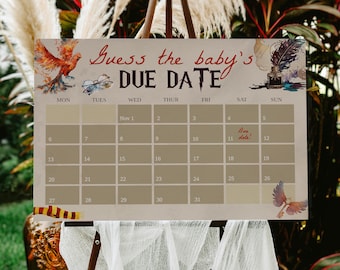 May include: A brown and beige calendar with the words "Guess the baby's DUE DATE" printed in red and black. The calendar is set up for the month of November and has a phoenix bird illustration on the left and a quill pen illustration on the right.