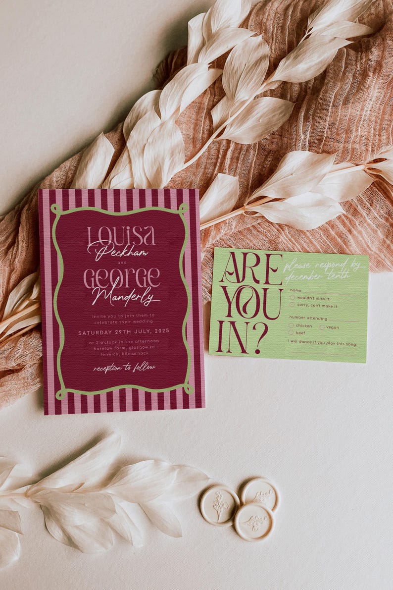 May include: Wedding invitation suite featuring a burgundy and green color scheme. The main invitation has a striped border and elegant typography. A response card with "ARE YOU IN?" is also present, along with floral wax seals.