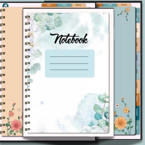 May include: A spiral-bound notebook with a white cover featuring watercolor eucalyptus leaves and the word Notebook in black script. A light blue rectangular label with three horizontal lines sits in the center. Additional pages with floral designs and tabbed dividers are visible.