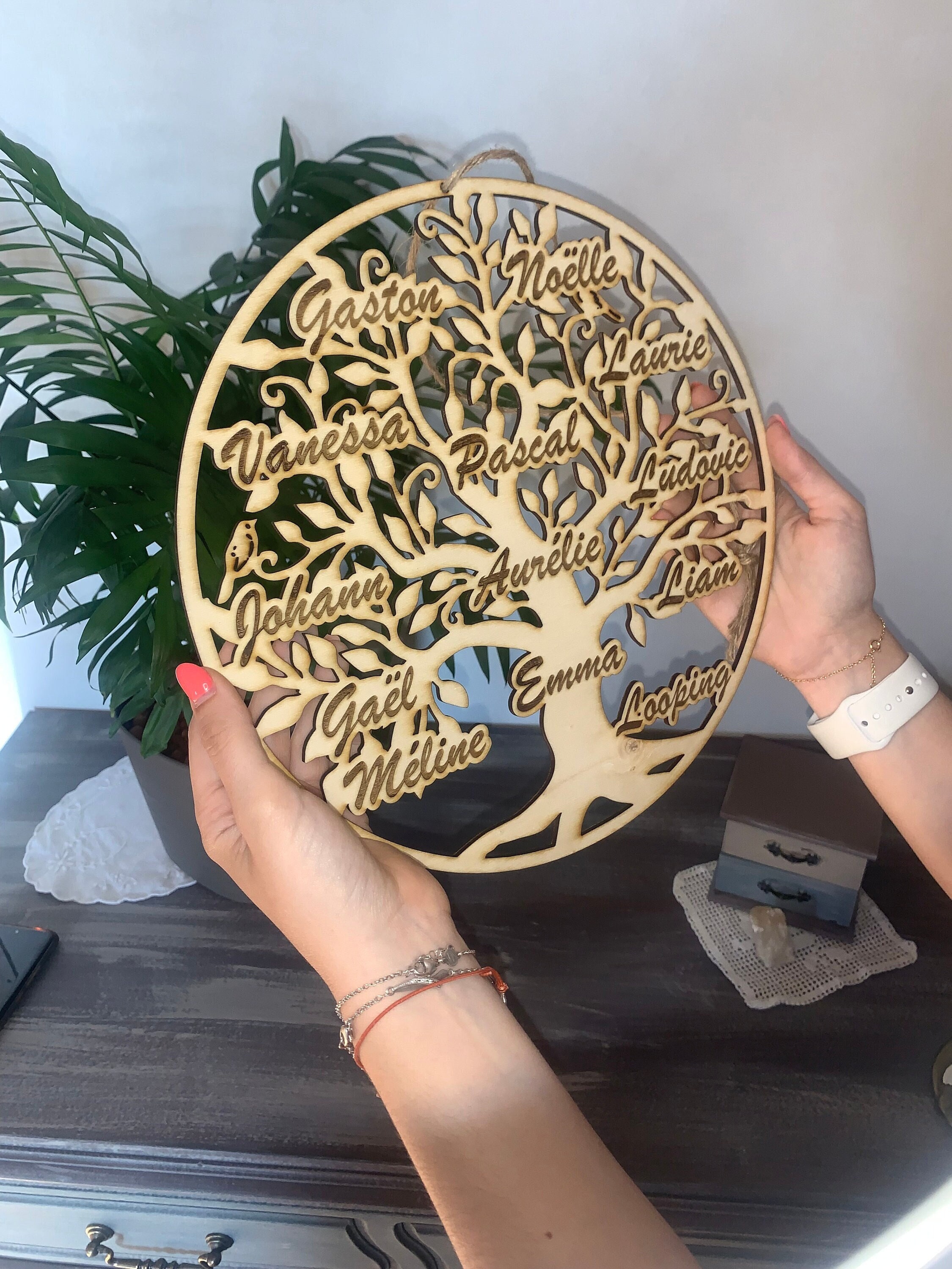 Personalized wooden tree of life with all the first names of family and friends