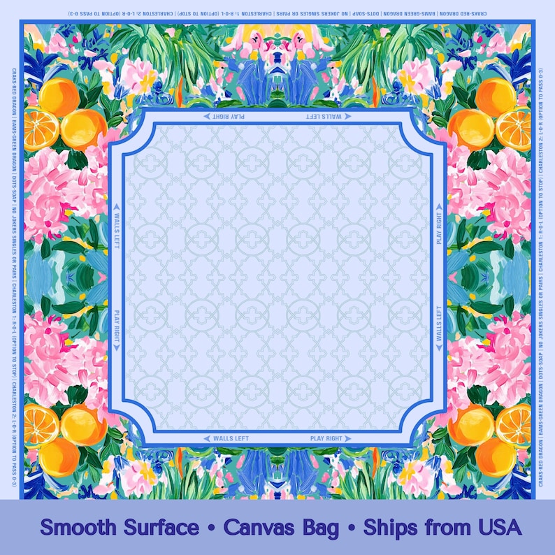 May include: A colorful canvas bag with a floral and fruit design. The bag features oranges, pink flowers, and green foliage around a light blue frame. The text "Smooth Surface" and "Canvas Bag" are visible.