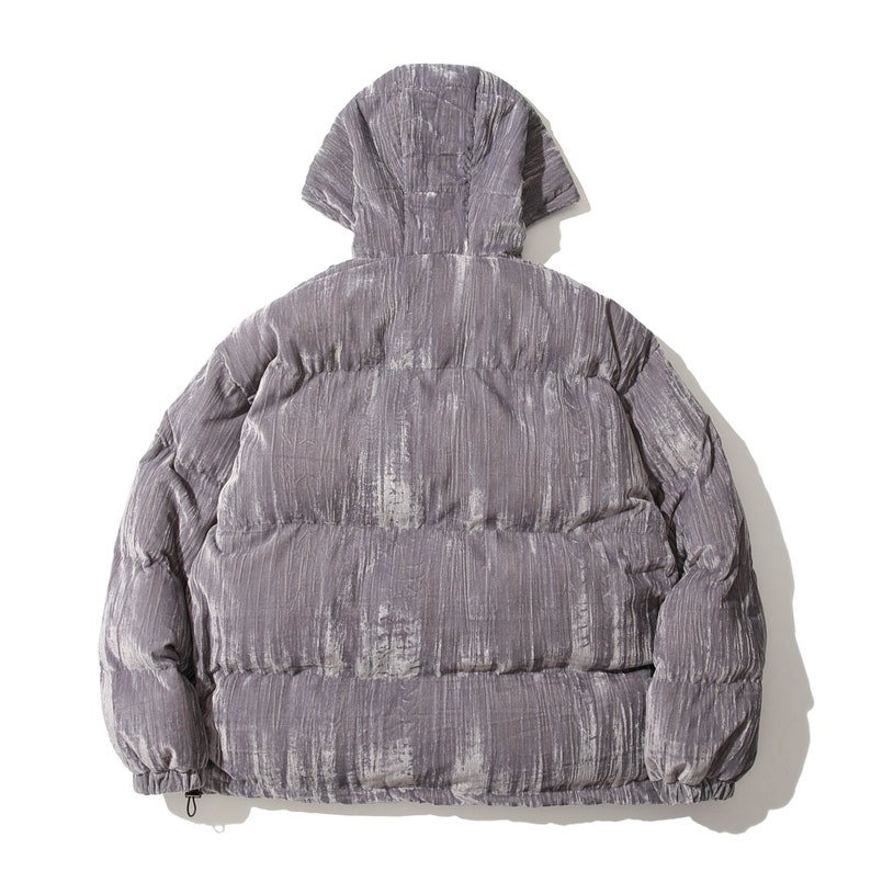 May include: A gray puffer jacket with a hood, viewed from the back. The jacket has a textured, vertical stripe pattern and a drawstring at the bottom hem. The fabric has a subtle sheen.