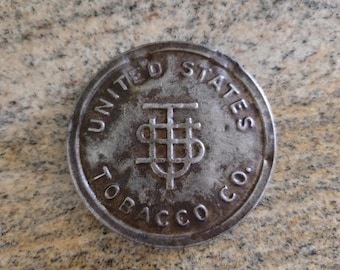 Puszka na tytoń do żucia United States Tobacco Co. z lat 80. XX wieku