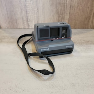 Polaroid Impulse Portrait Instant Camera 600 Plus with Built in Flash and Strap