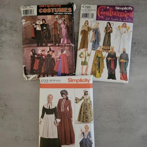 May include: Three Simplicity sewing patterns for costumes. The first pattern is for a vampire, witch, and a medieval character. The second pattern is for a nativity scene with characters like a shepherd, angel, and wise men. The third pattern is for three colonial era dresses.